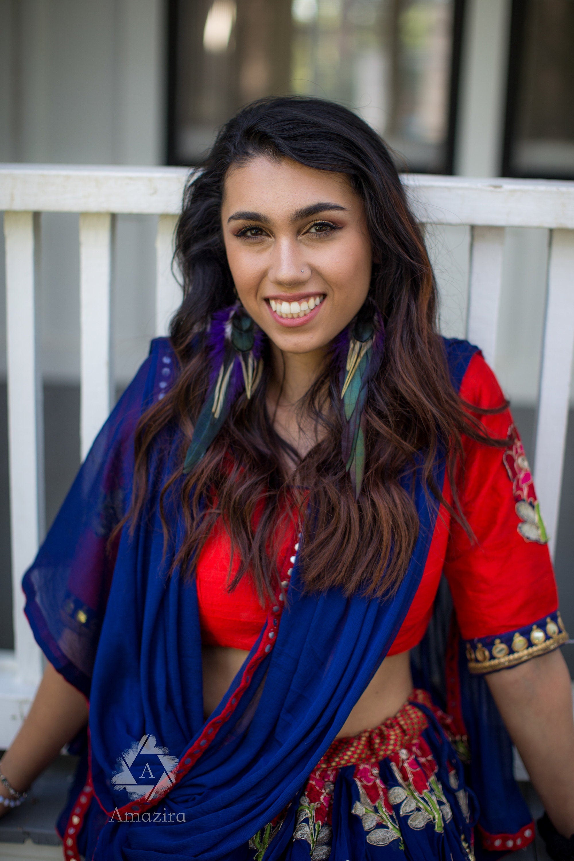 Purple and green drop feather earrings