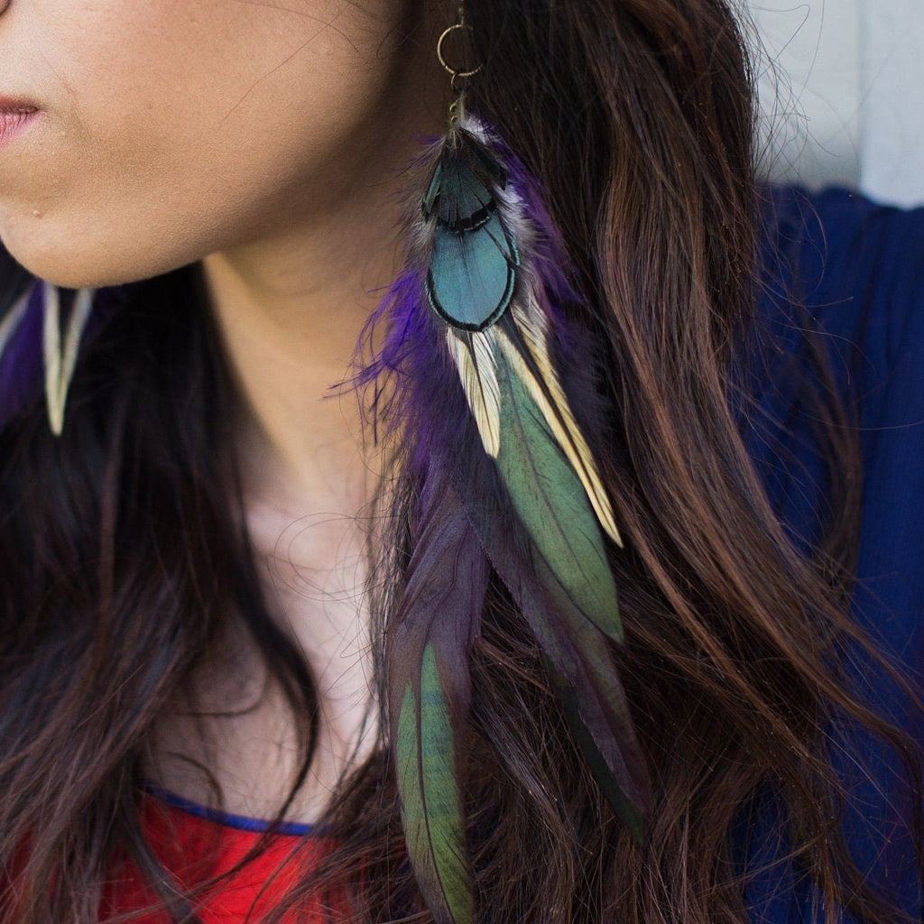 Purple and green drop feather earrings