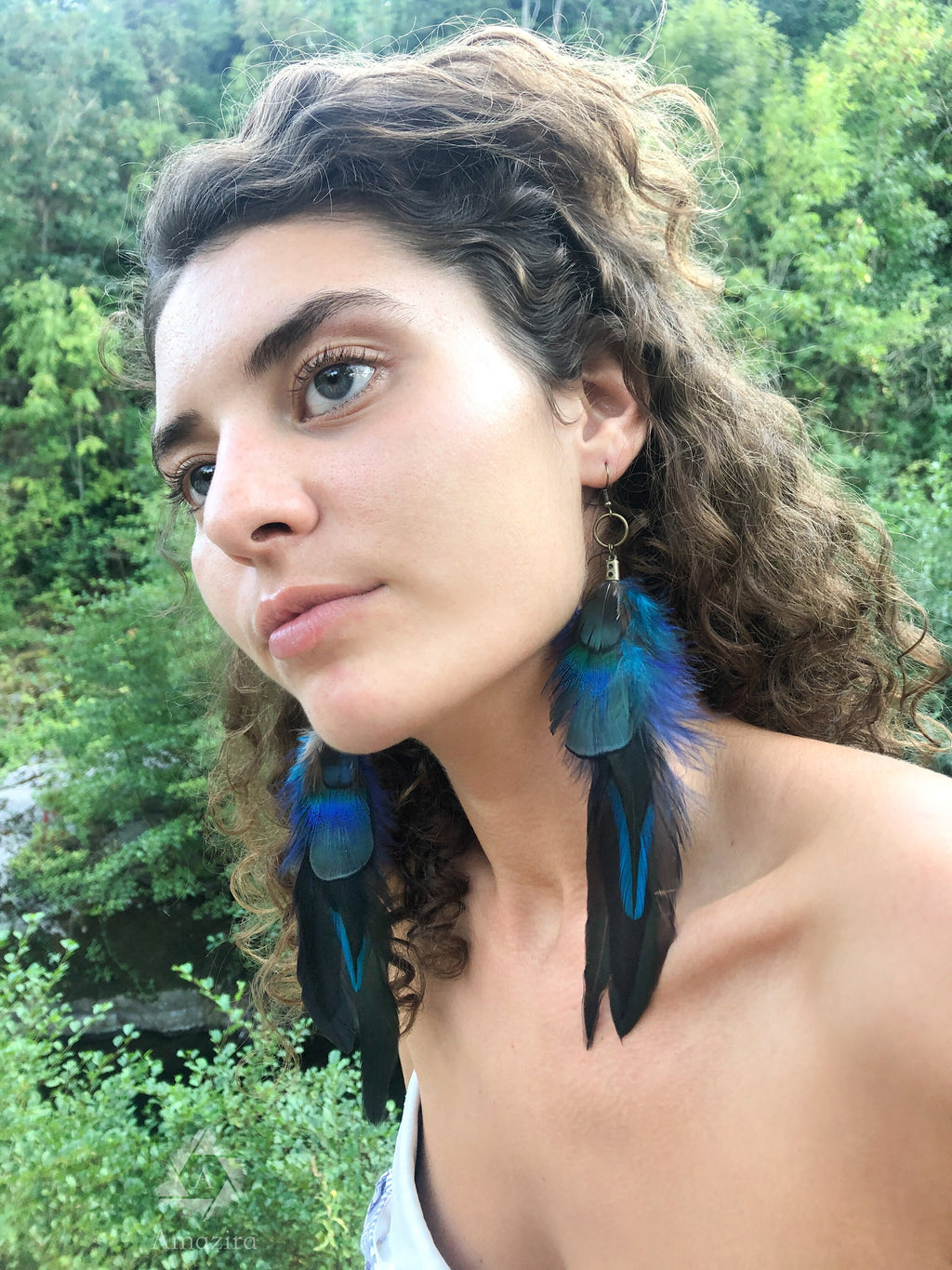 Long blue unique feather earrings