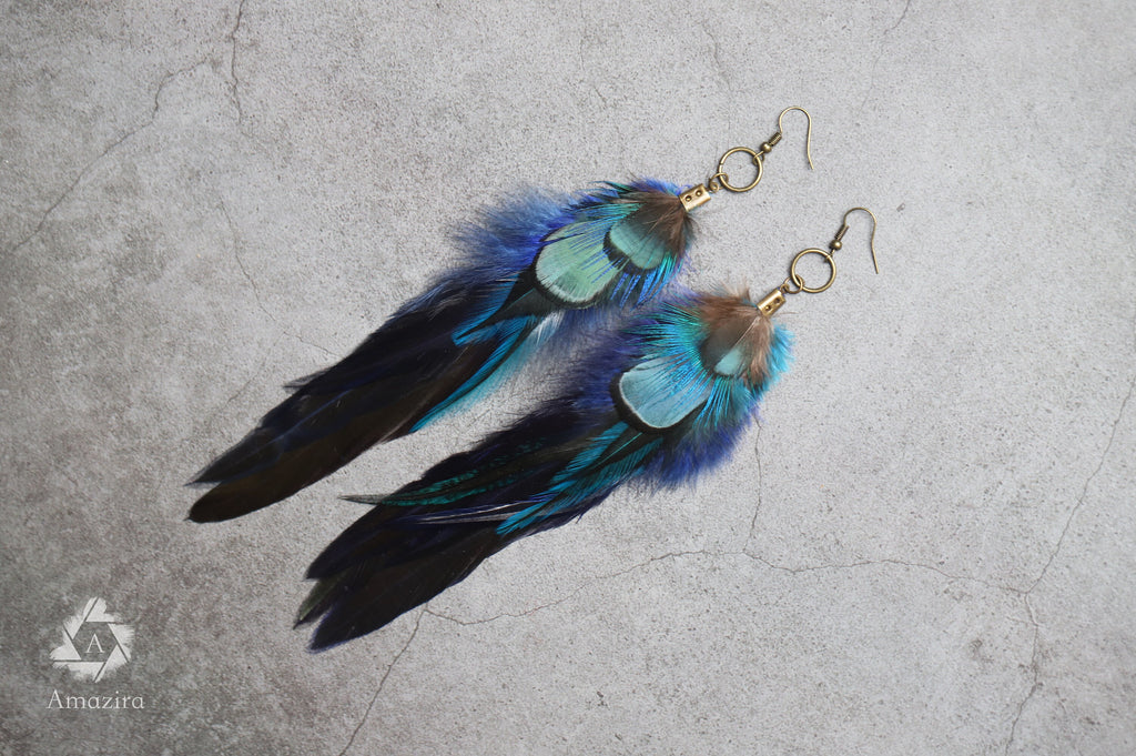 Long blue unique feather earrings
