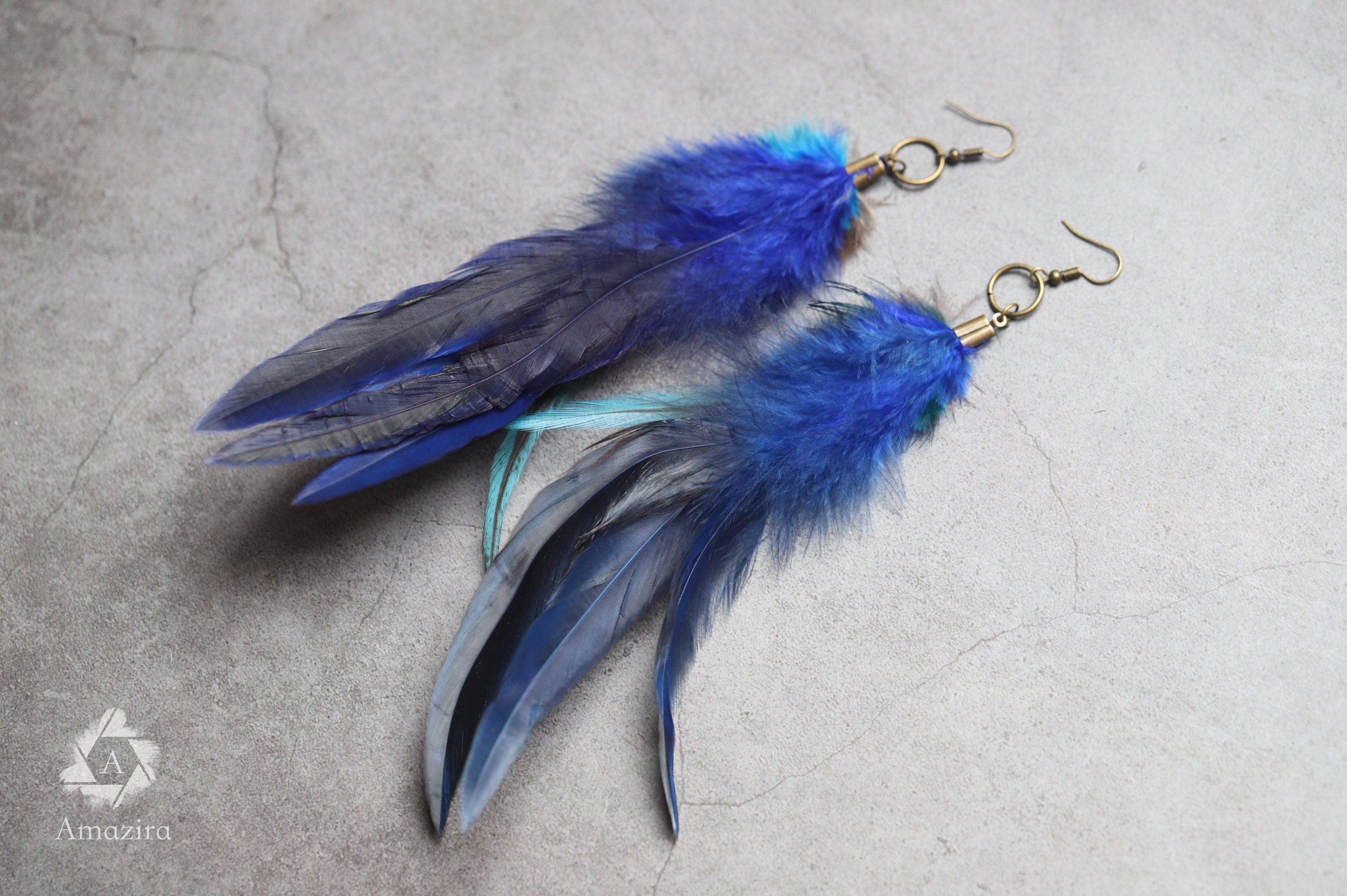 Long blue unique feather earrings