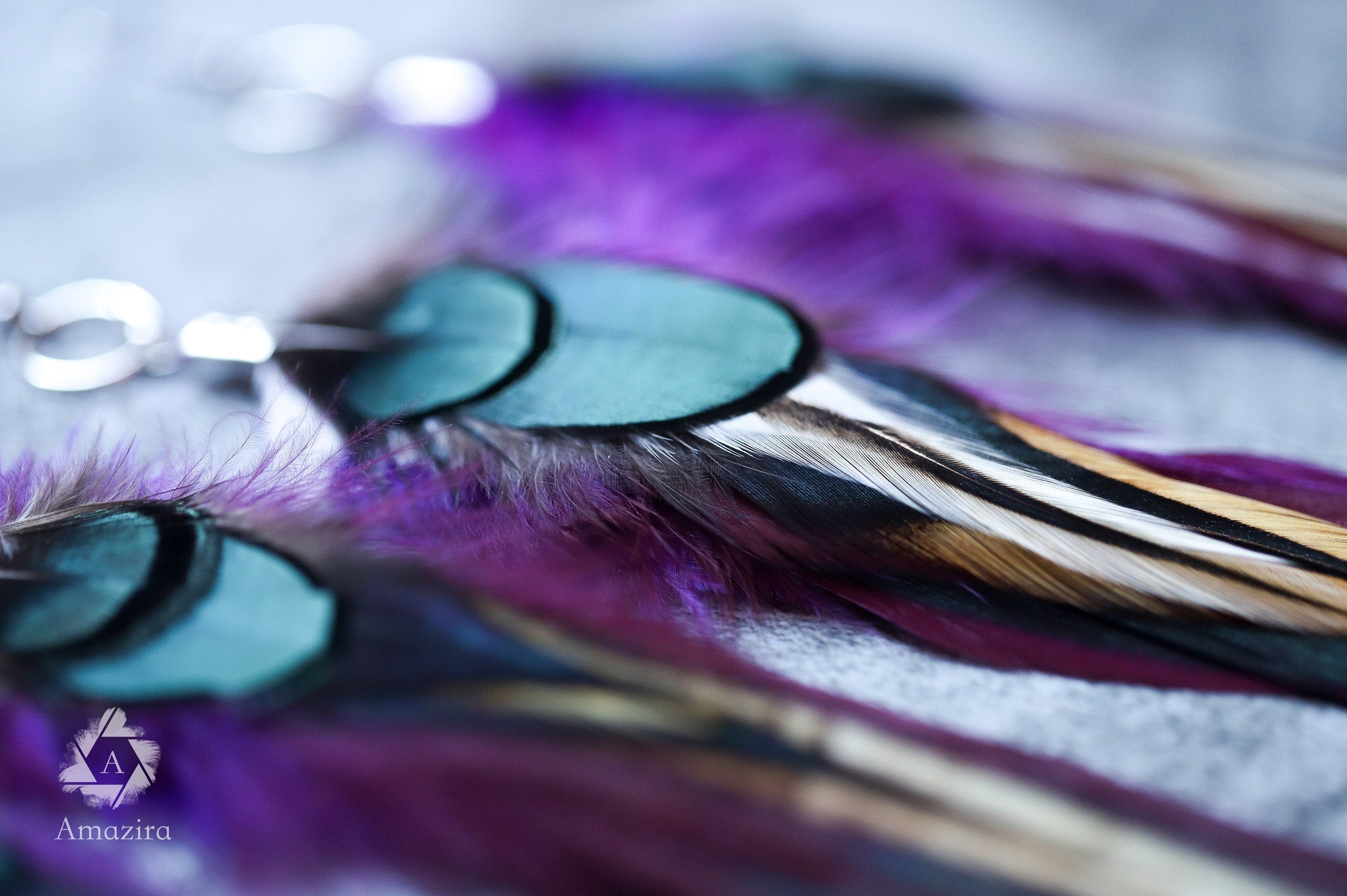 Purple and green drop feather earrings