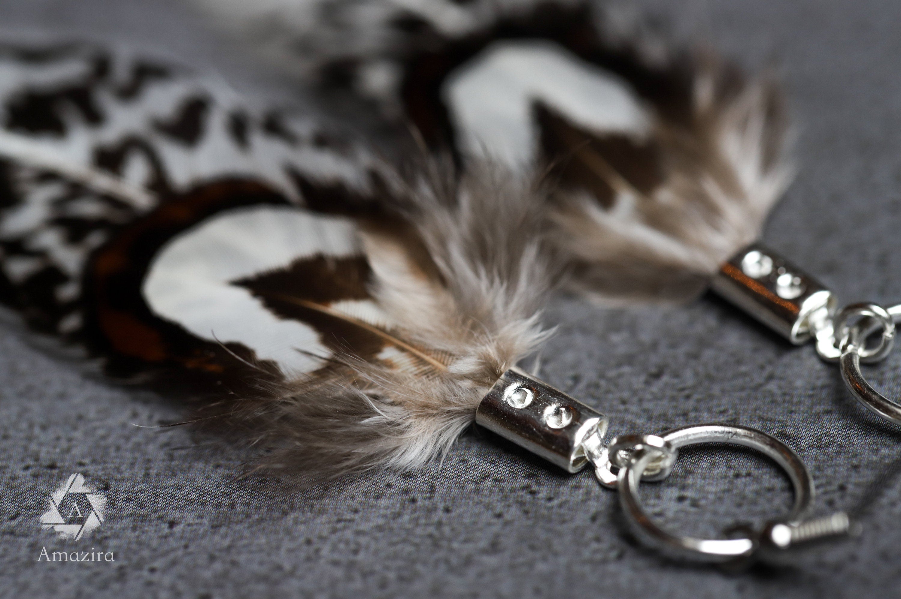 Red tip feather earrings