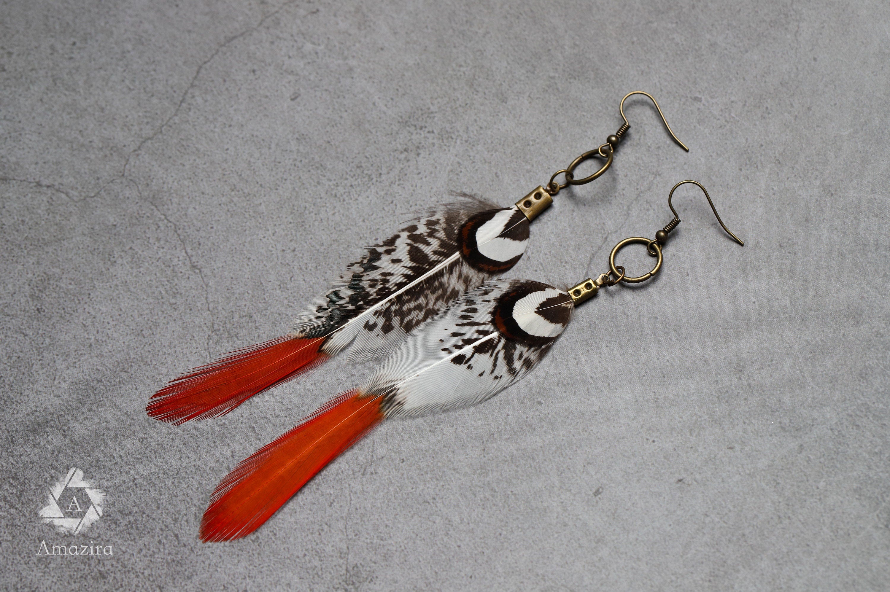 Red tip feather earrings