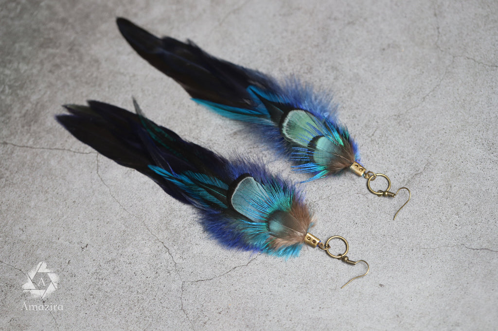 Long blue unique feather earrings