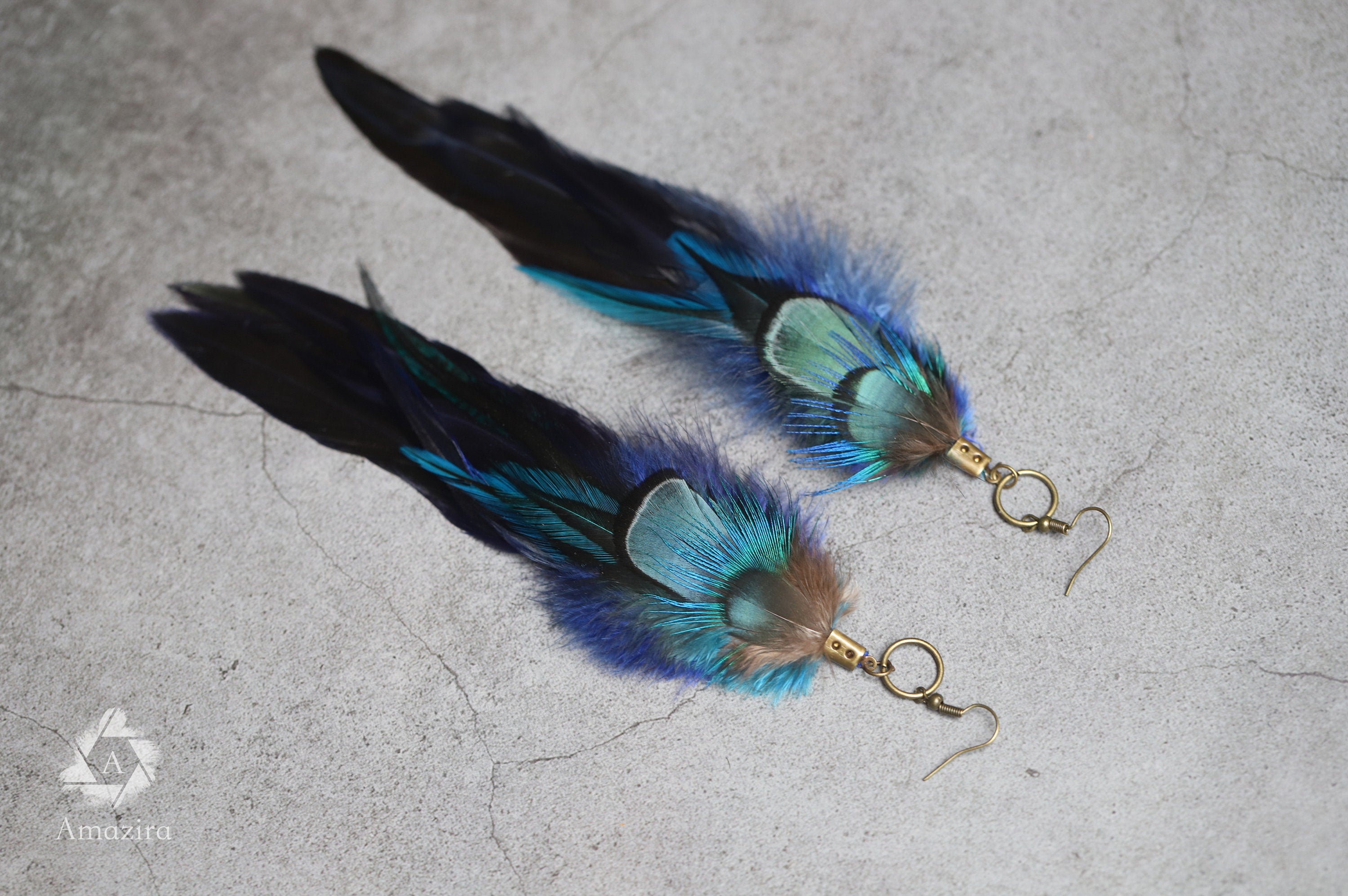 Long blue unique feather earrings