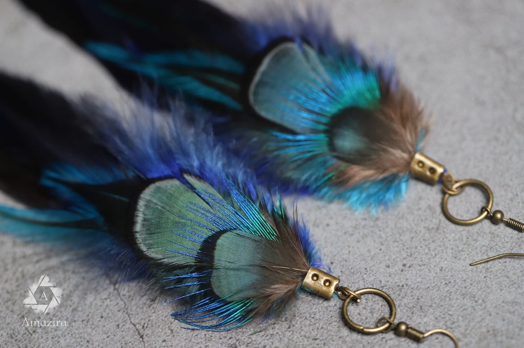 Long blue unique feather earrings