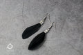 Small delicate black handmade feather earrings