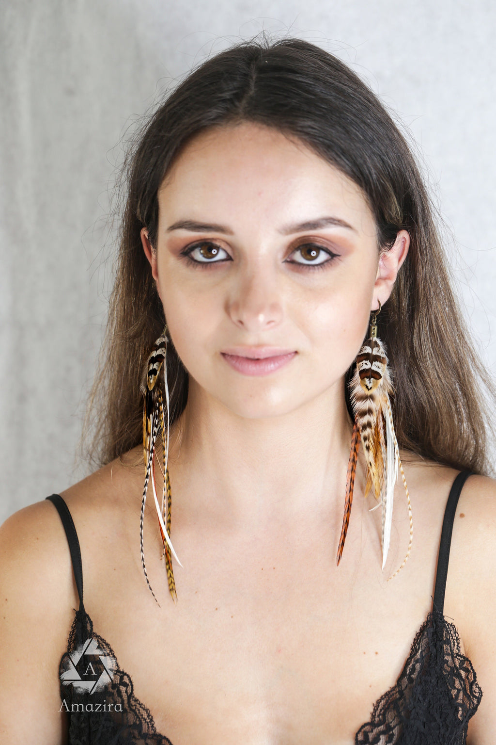 Long natural striped real feather grizzly earring