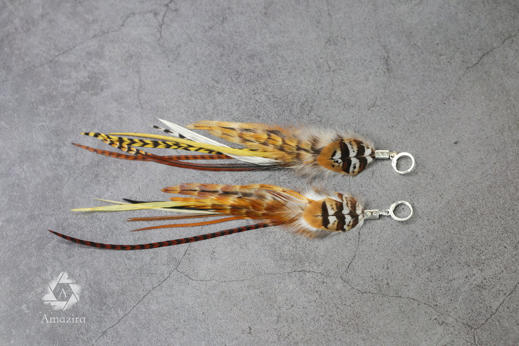 Long natural striped real feather grizzly earring