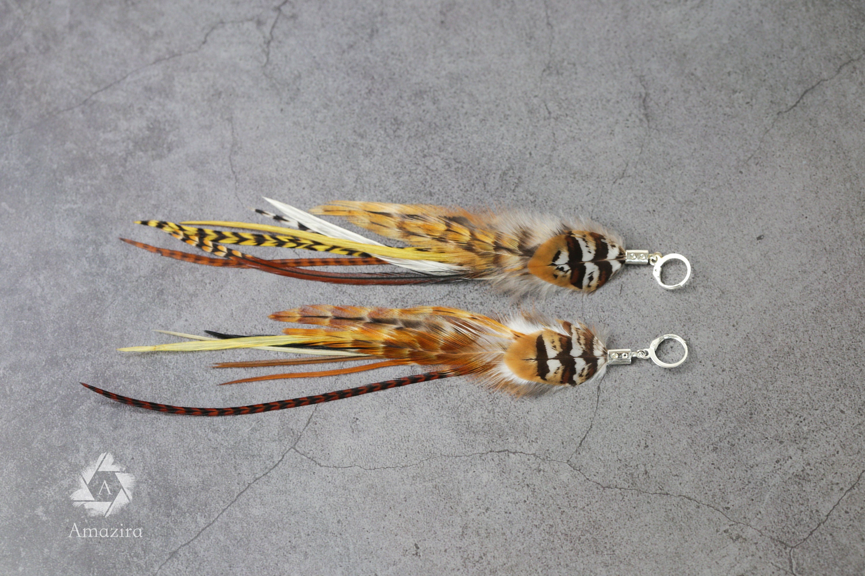 Long natural striped real feather grizzly earring