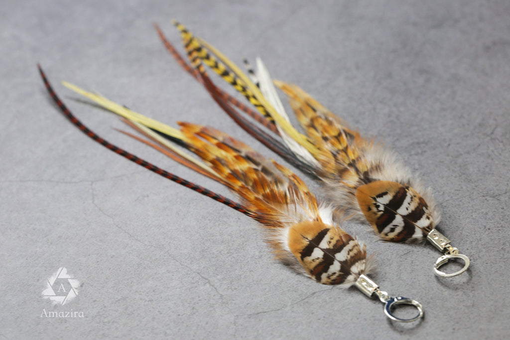 Long natural striped real feather grizzly earring