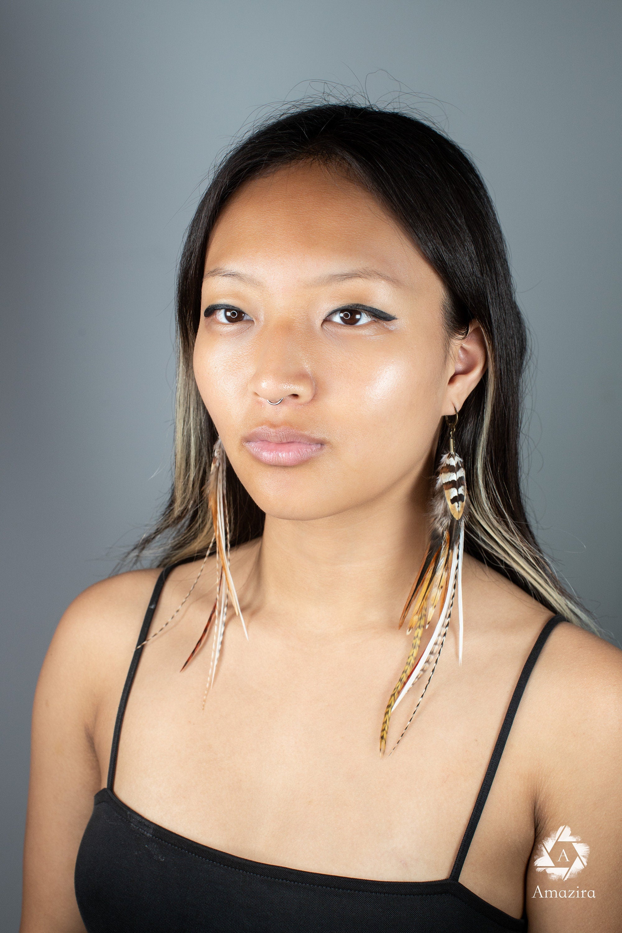 Long natural striped real feather grizzly earring