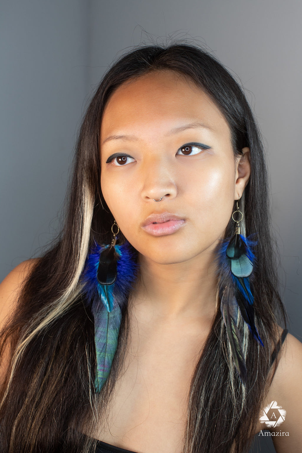 Long blue unique feather earrings