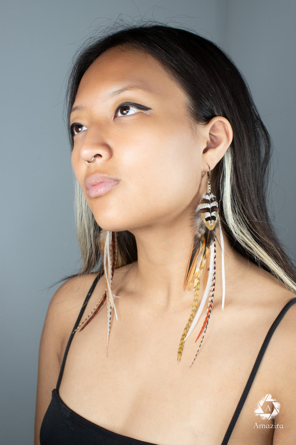 Long natural striped real feather grizzly earring