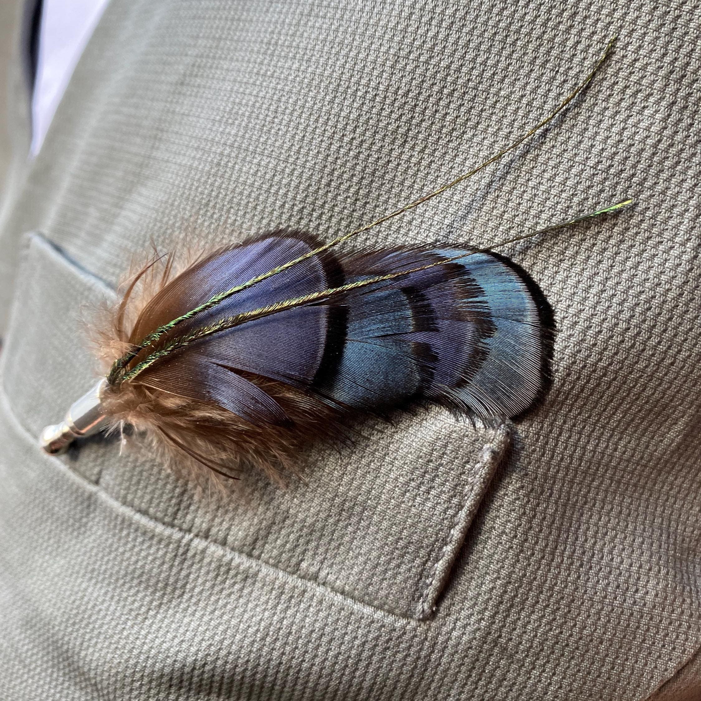 Elegant iridescent blue brooch