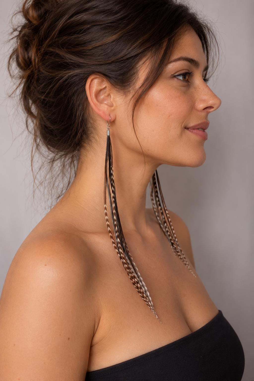 Black stripped grizzly feather earrings