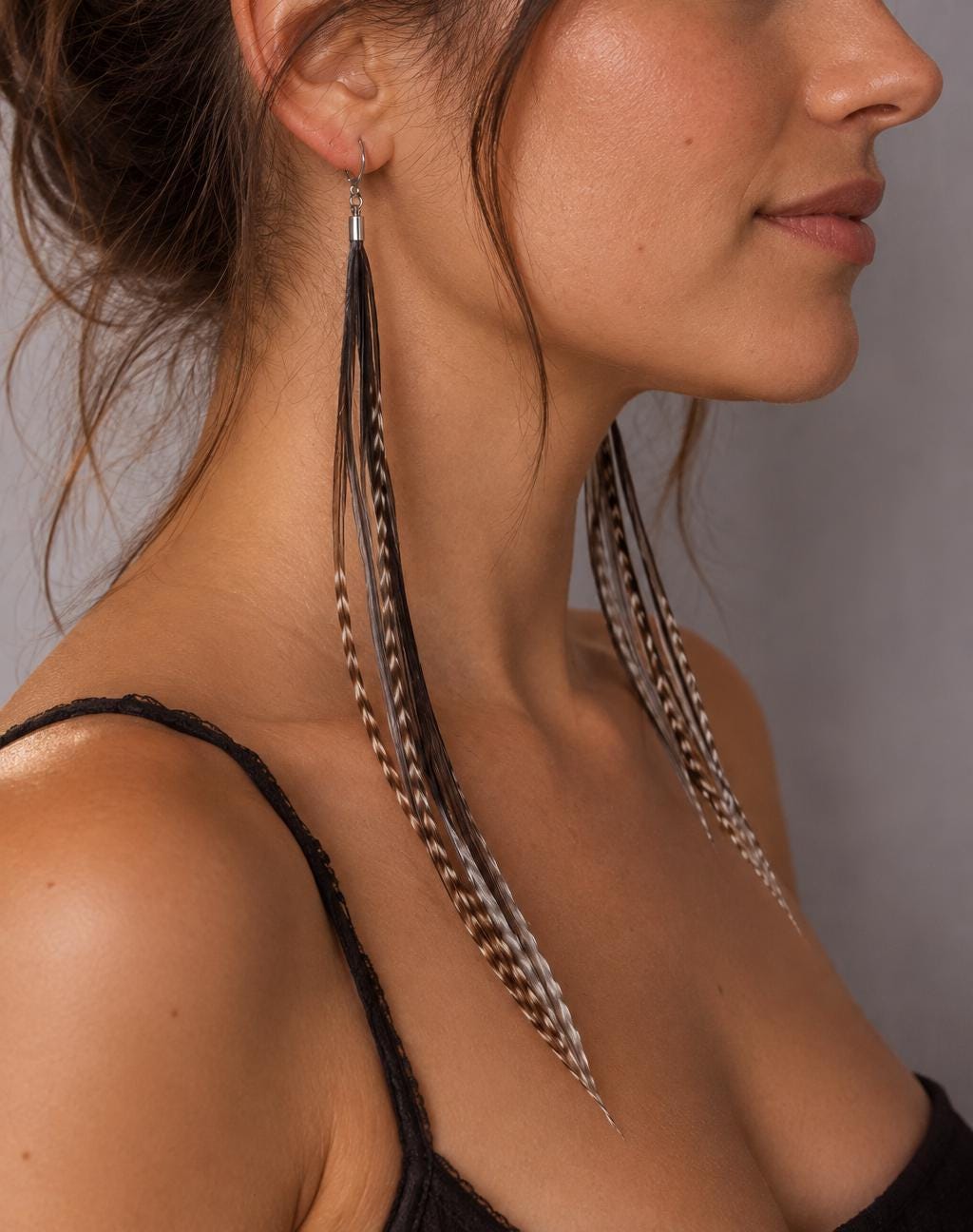Black stripped grizzly feather earrings